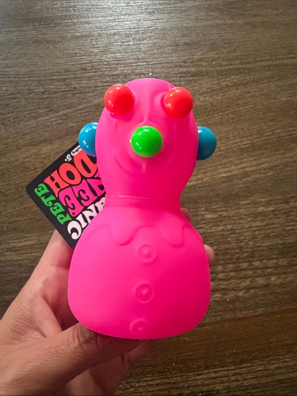 Needoh Panic Pete Bright Pink Sensory Squeeze Toy with Colorful Bumps